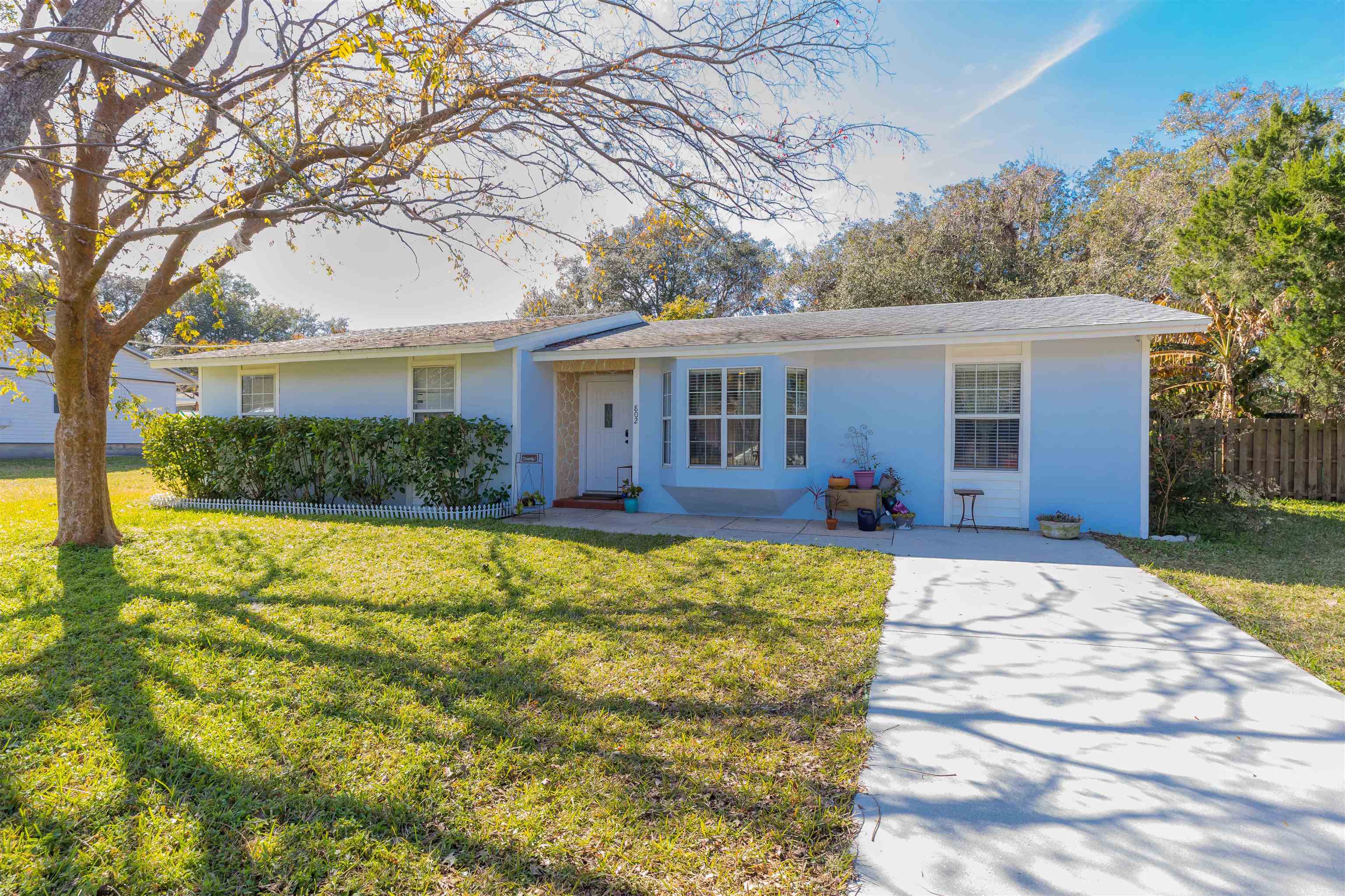 802 Royal Road St. Augustine, FL 32086 - Photo 1 of 47 a front view of house with yard and trees around