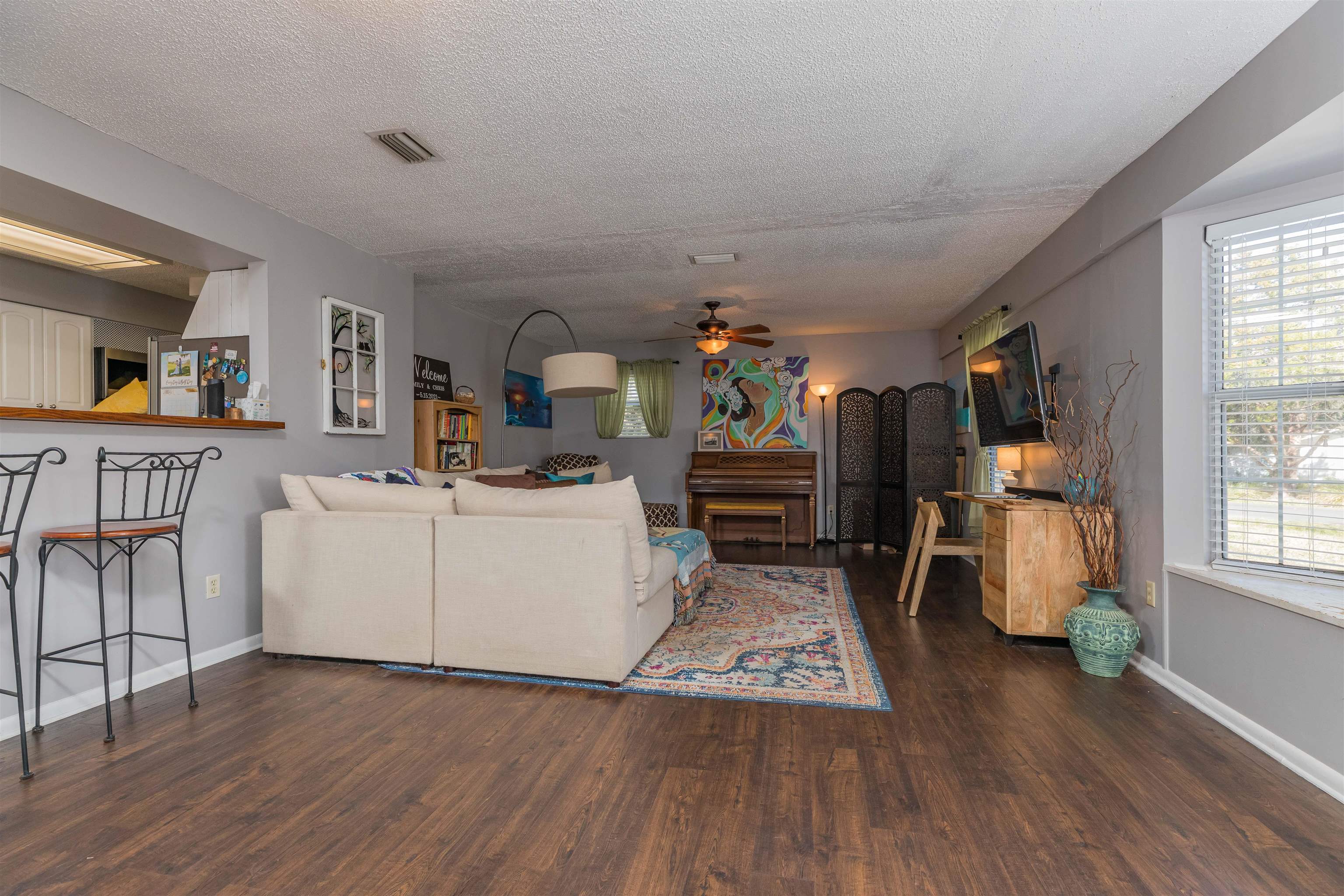 802 Royal Road St. Augustine, FL 32086 - Photo 11 of 47 a living room with furniture and a wooden floor