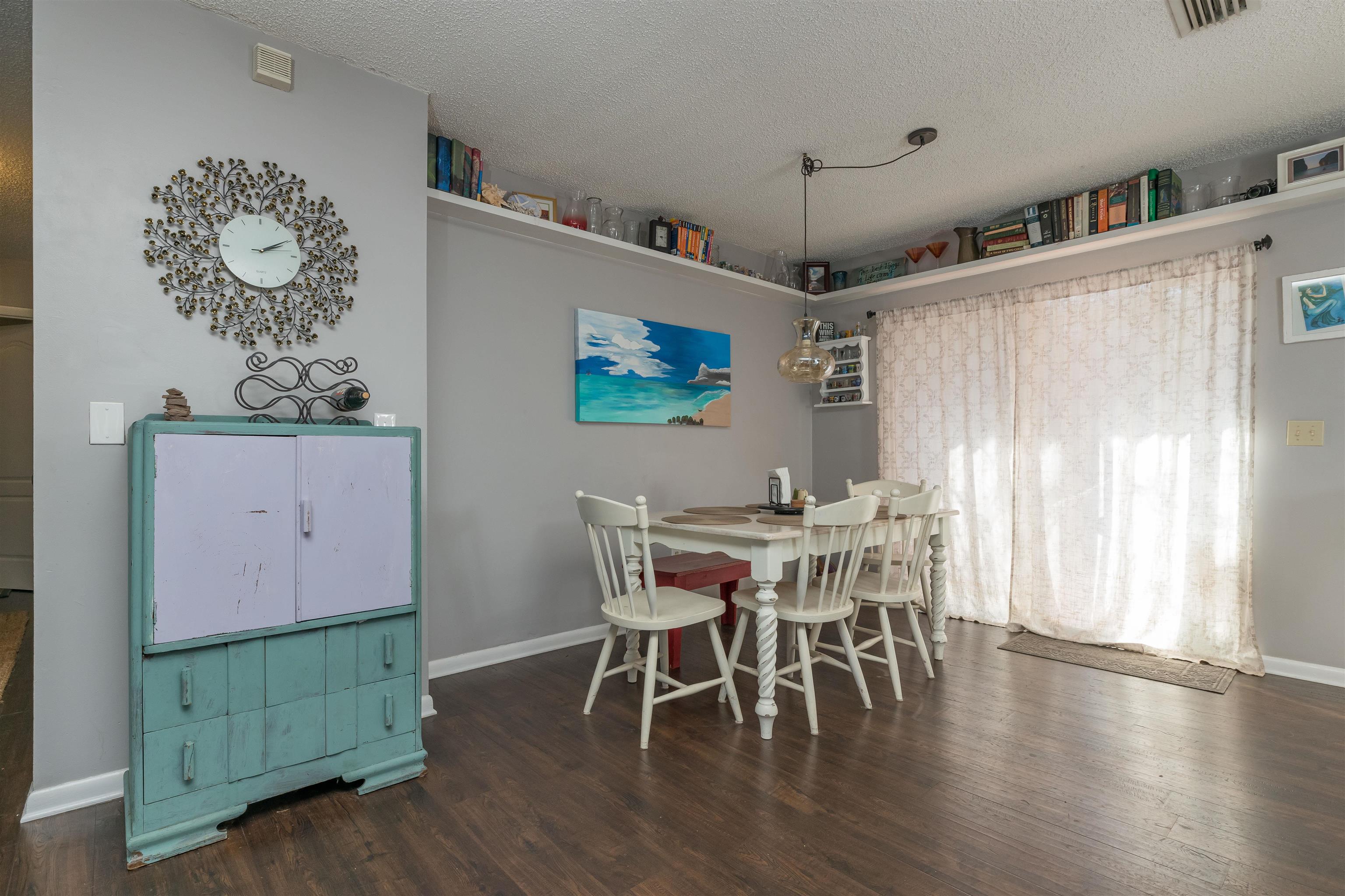 802 Royal Road St. Augustine, FL 32086 - Photo 15 of 47 a view of a dining room with furniture window and wooden floor