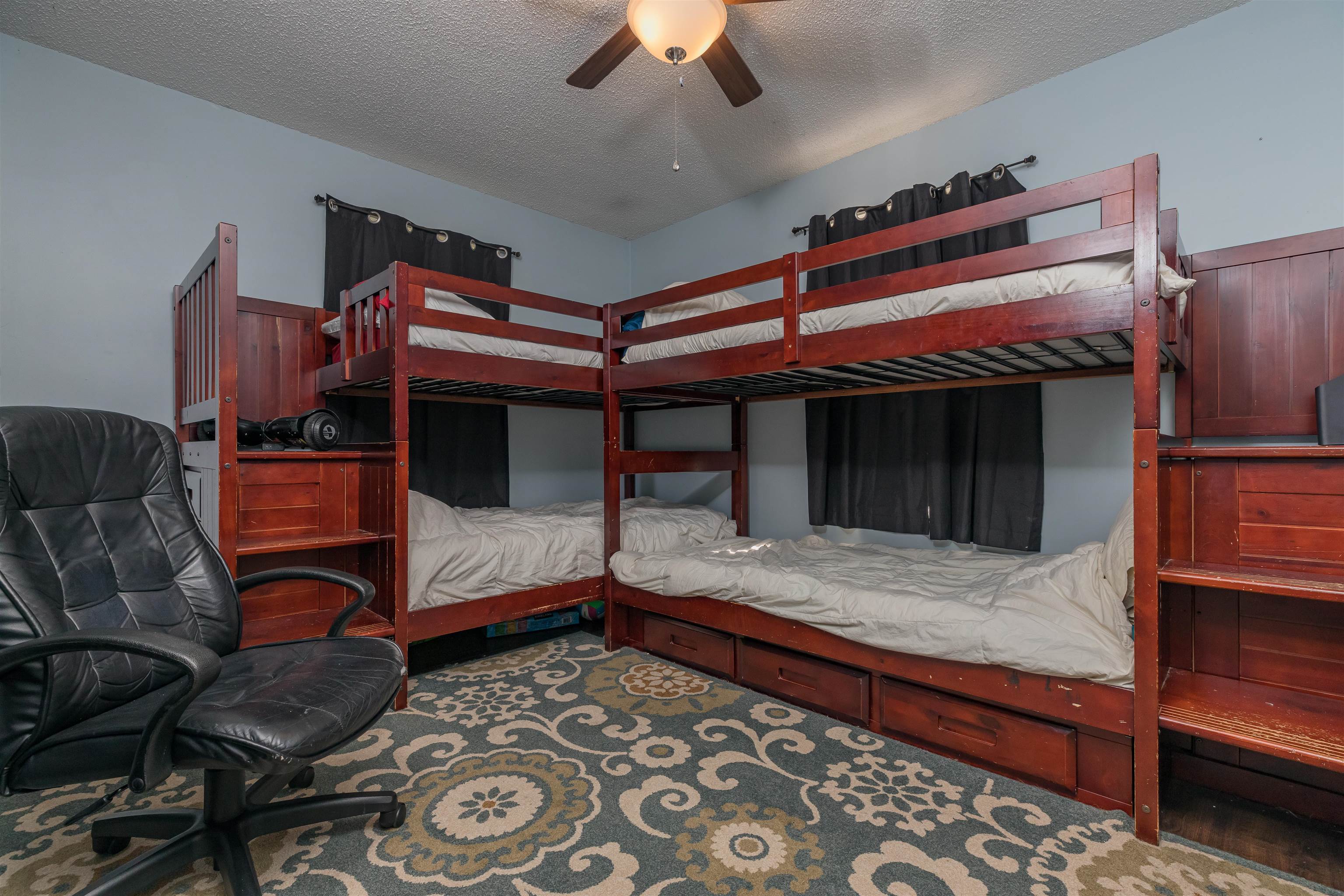 802 Royal Road St. Augustine, FL 32086 - Photo 20 of 47 a bedroom with a bed and a ceiling fan