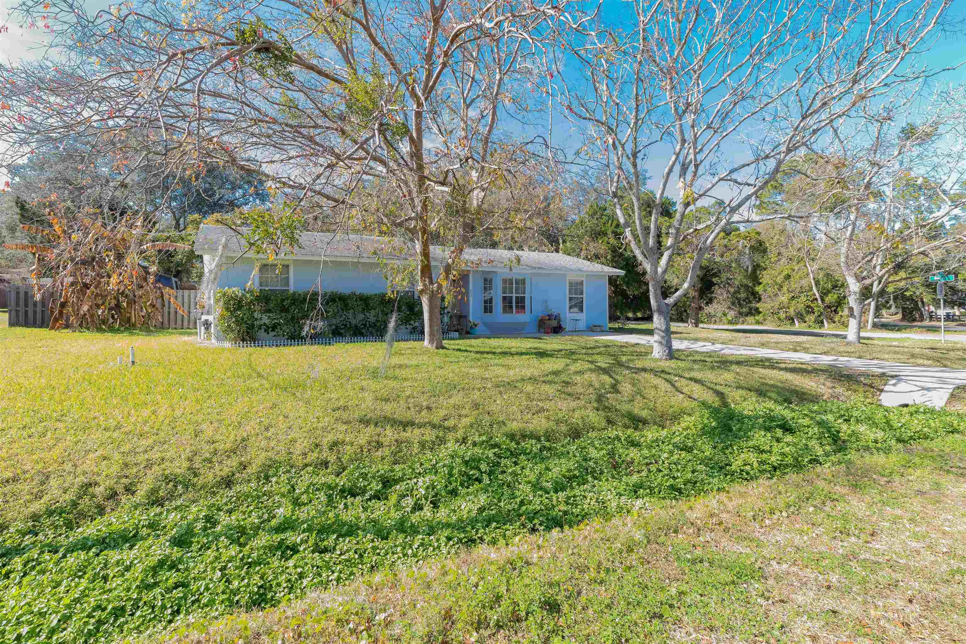 802 Royal Road St. Augustine, FL 32086 - Photo 28 of 47 a view of a house with a yard