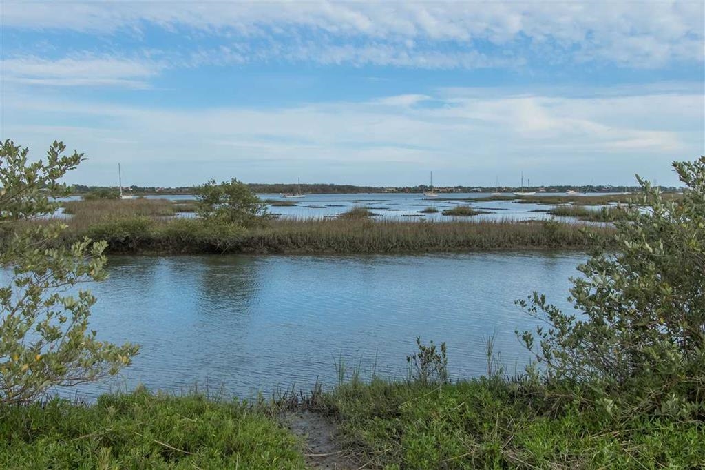 802 Royal Road St. Augustine, FL 32086 - Photo 42 of 47 a view of a lake with a city