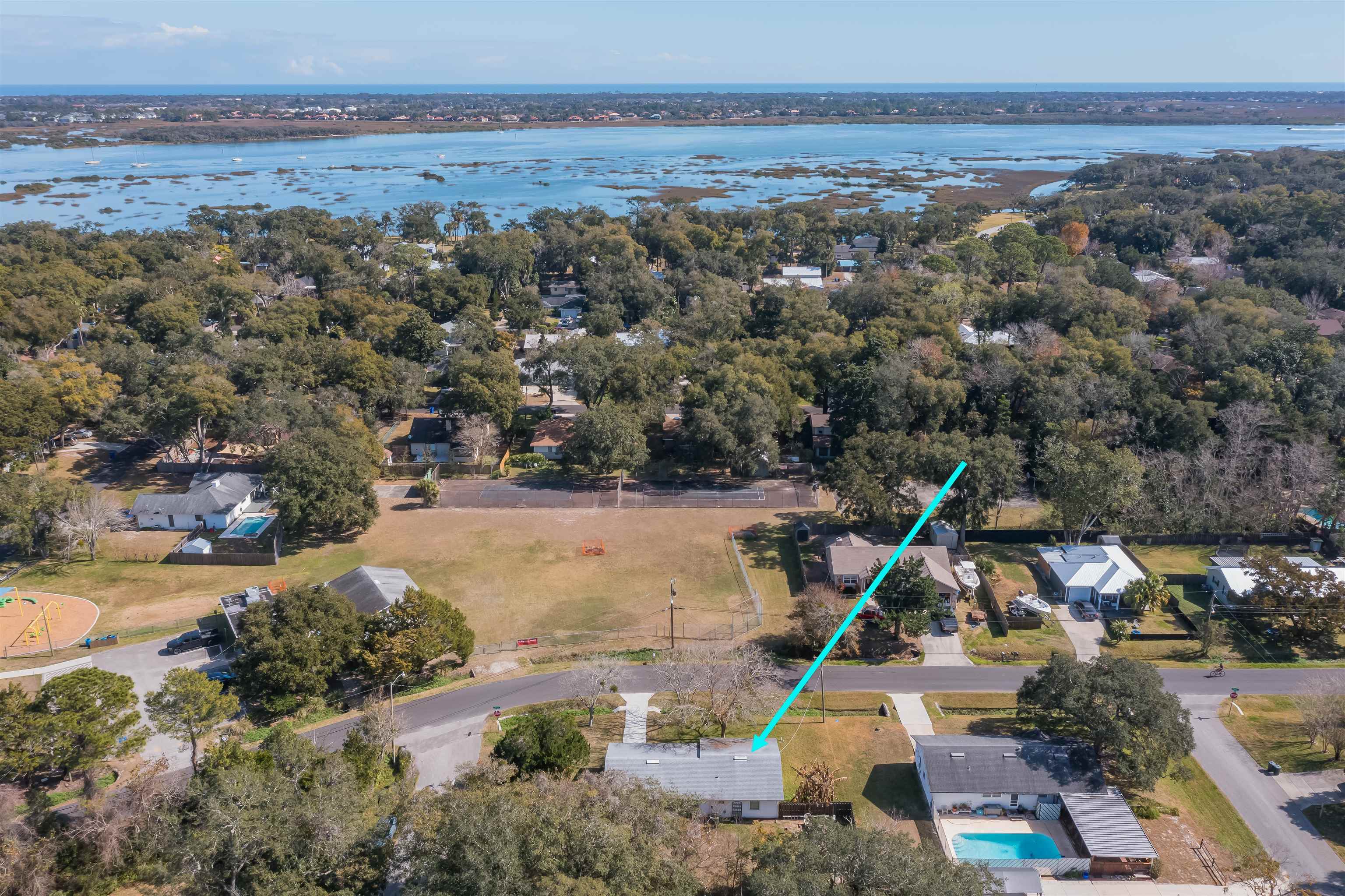 802 Royal Road St. Augustine, FL 32086 - Photo 6 of 47 a view of a yard with a forest