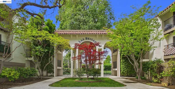 a front view of a building with garden
