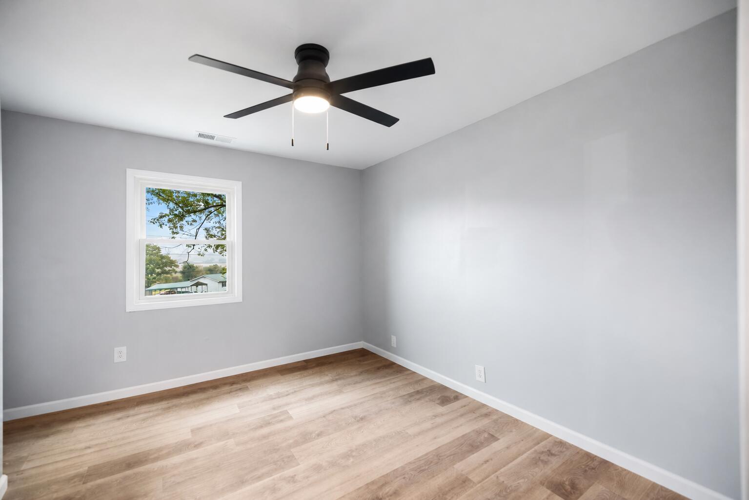 6847 Campton Road Stanton, KY 40380 - Photo 23 of 42 Black ceiling fan with glowing light
