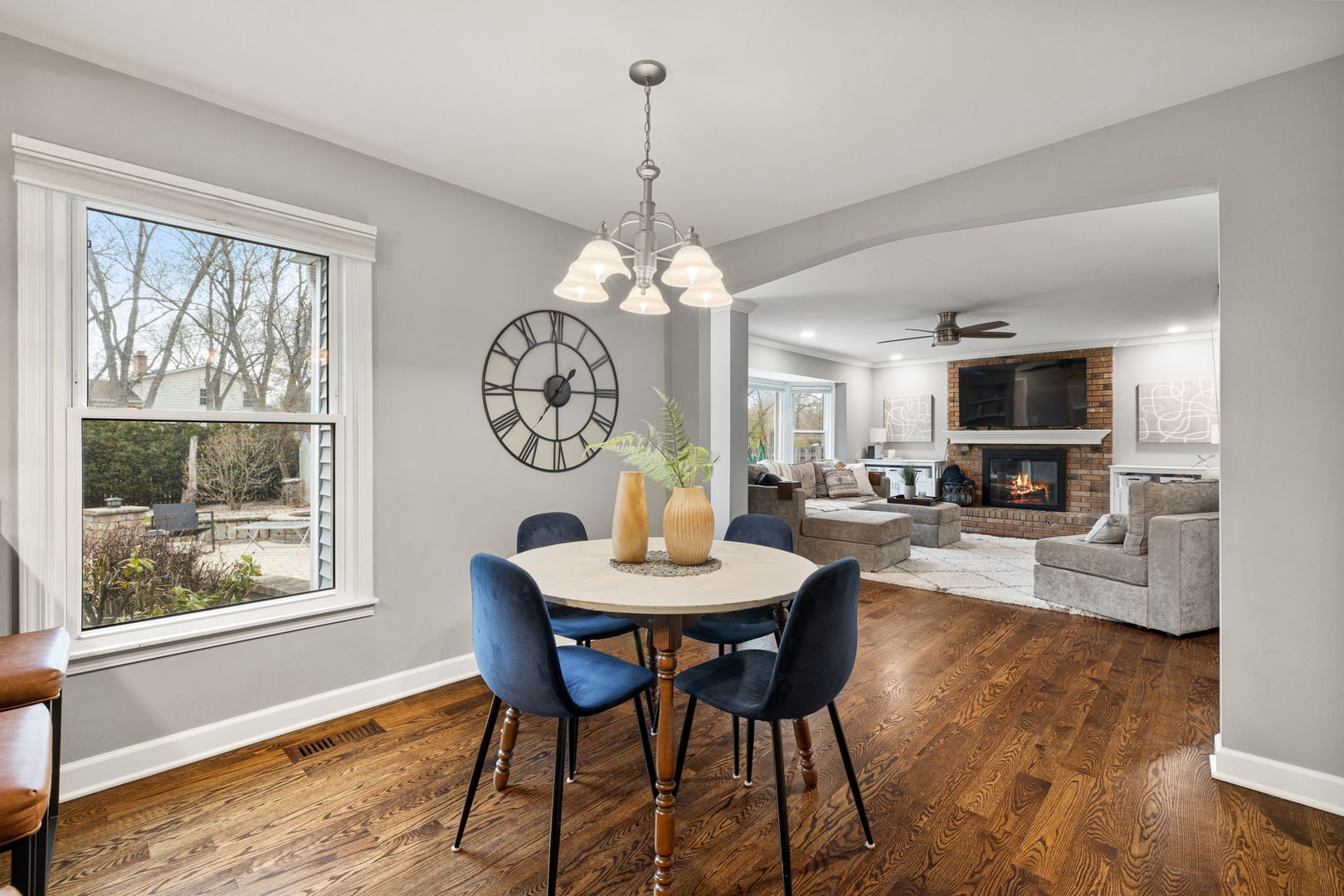 1635 Orth Drive Wheaton, IL 60189 - Photo 26 of 36 a dining room with furniture a window and a chandelier