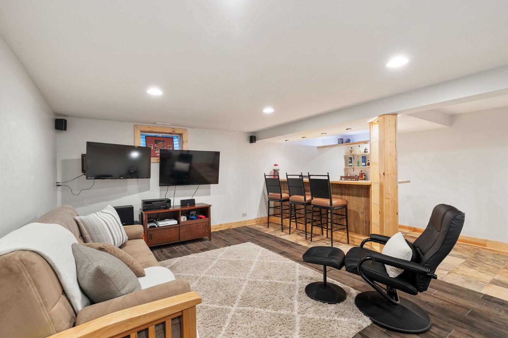 1635 Orth Drive Wheaton, IL 60189 - Photo 29 of 36 a living room with furniture and a flat screen tv
