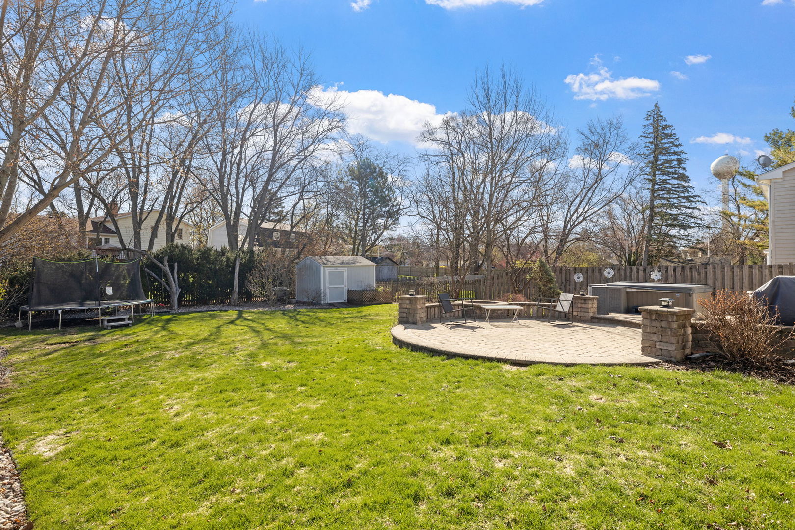 1635 Orth Drive Wheaton, IL 60189 - Photo 4 of 36 a view of a swimming pool with an outdoor space and seating area