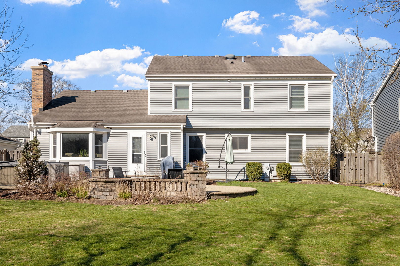 1635 Orth Drive Wheaton, IL 60189 - Photo 6 of 36 a front view of the house with a yard