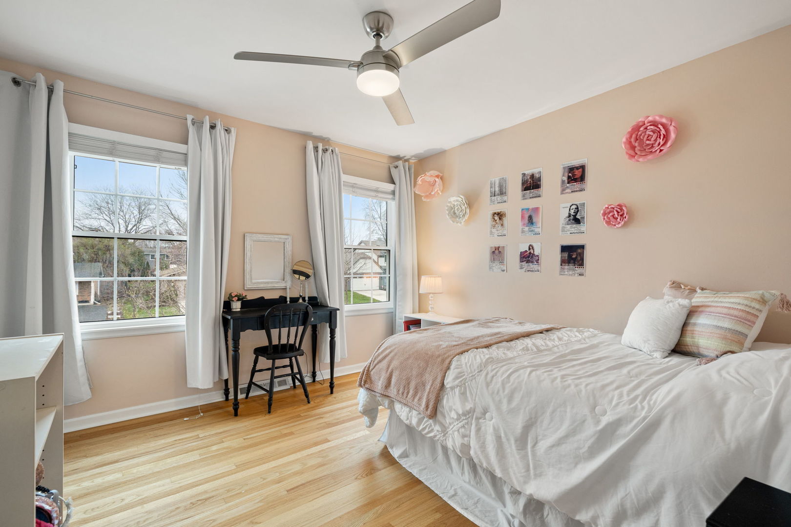 1635 Orth Drive Wheaton, IL 60189 - Photo 9 of 36 a bedroom with a bed and a table with chair