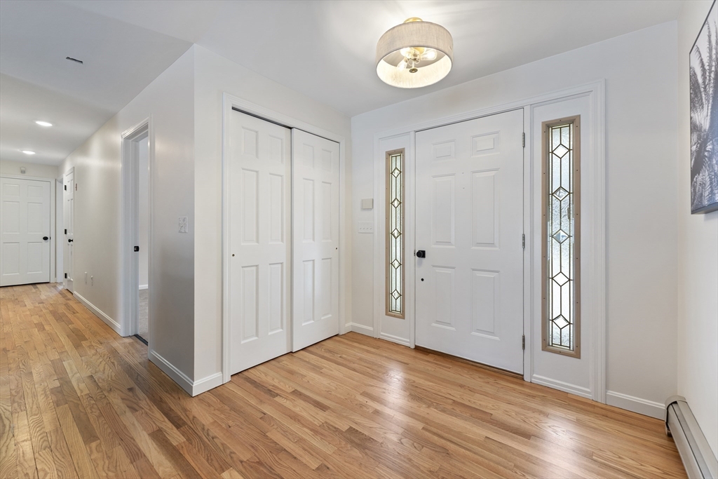 282 Loudville Road, Unit 1 Easthampton, MA 01027 - Photo 2 of 40 a view of an empty room with wooden floor