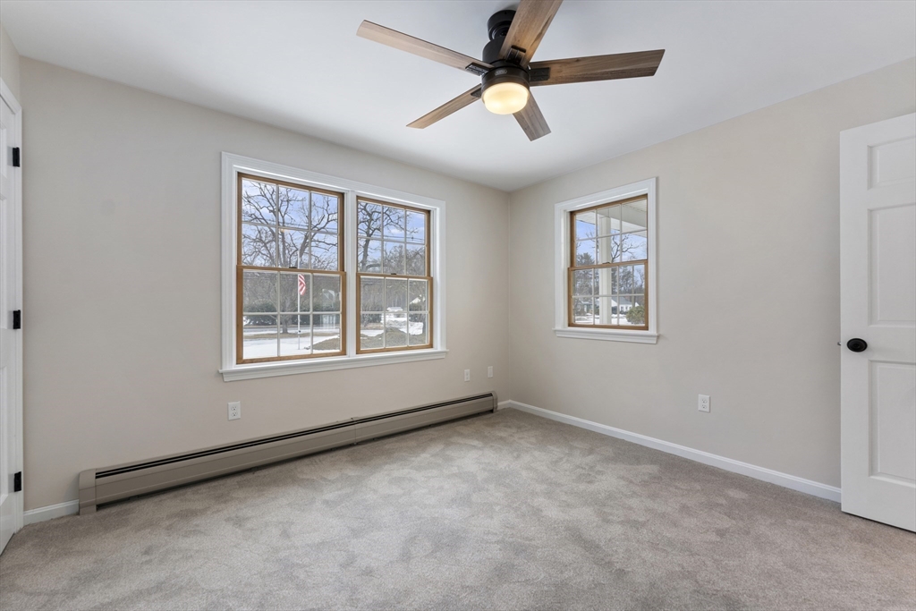 282 Loudville Road, Unit 1 Easthampton, MA 01027 - Photo 23 of 40 a view of an empty room with a window