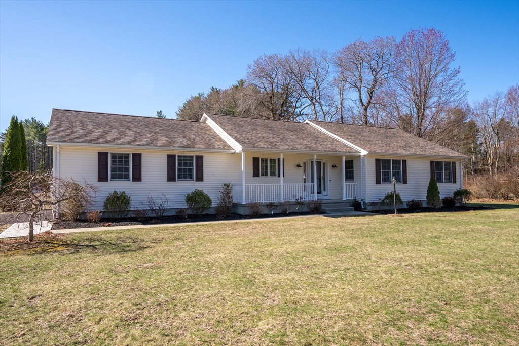 282 Loudville Road, Unit 1 Easthampton, MA 01027 - Photo 36 of 40 a front view of a house with a garden