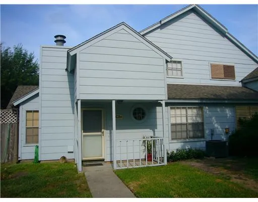 a view of a back yard of the house