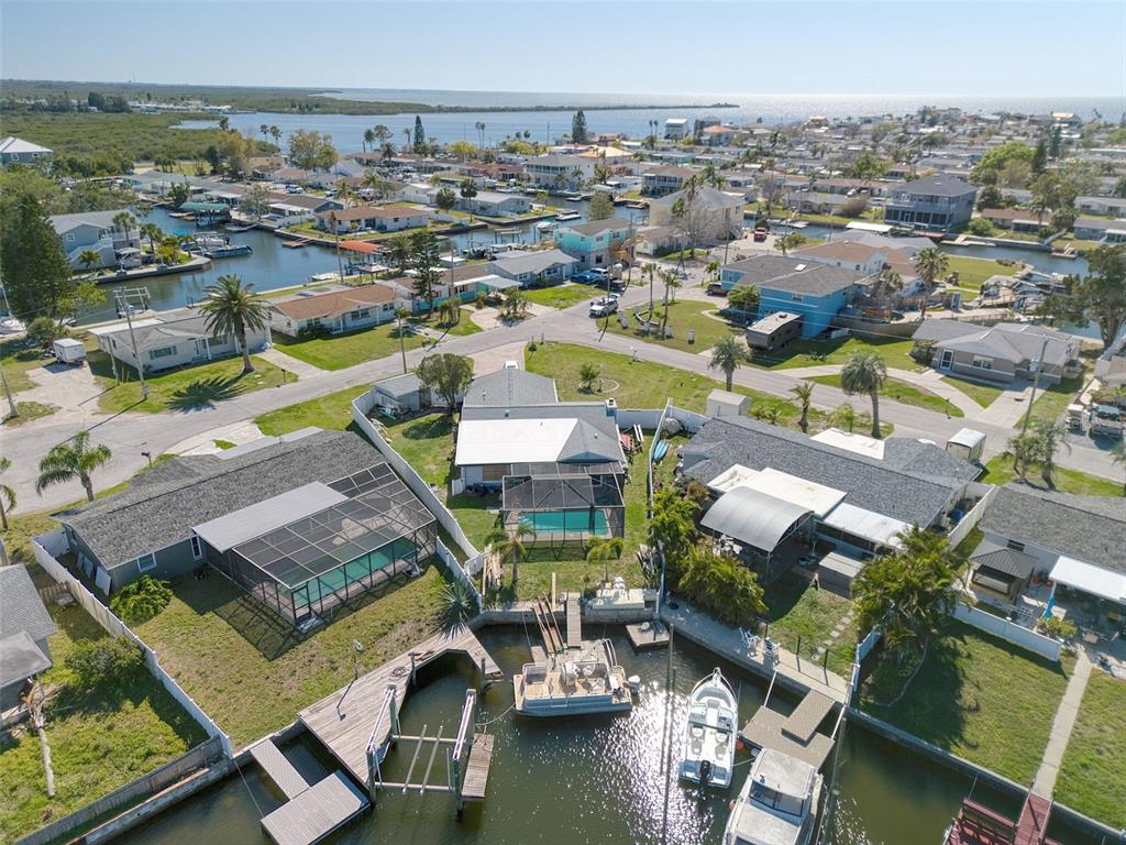 13630 Lagoon Drive Hudson, FL 34667 - Photo 25 of 26 an aerial view of a house with outdoor space