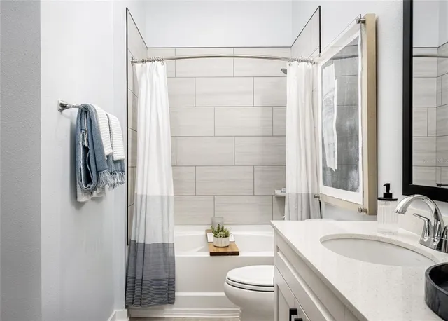 a view of a lake in front of the house