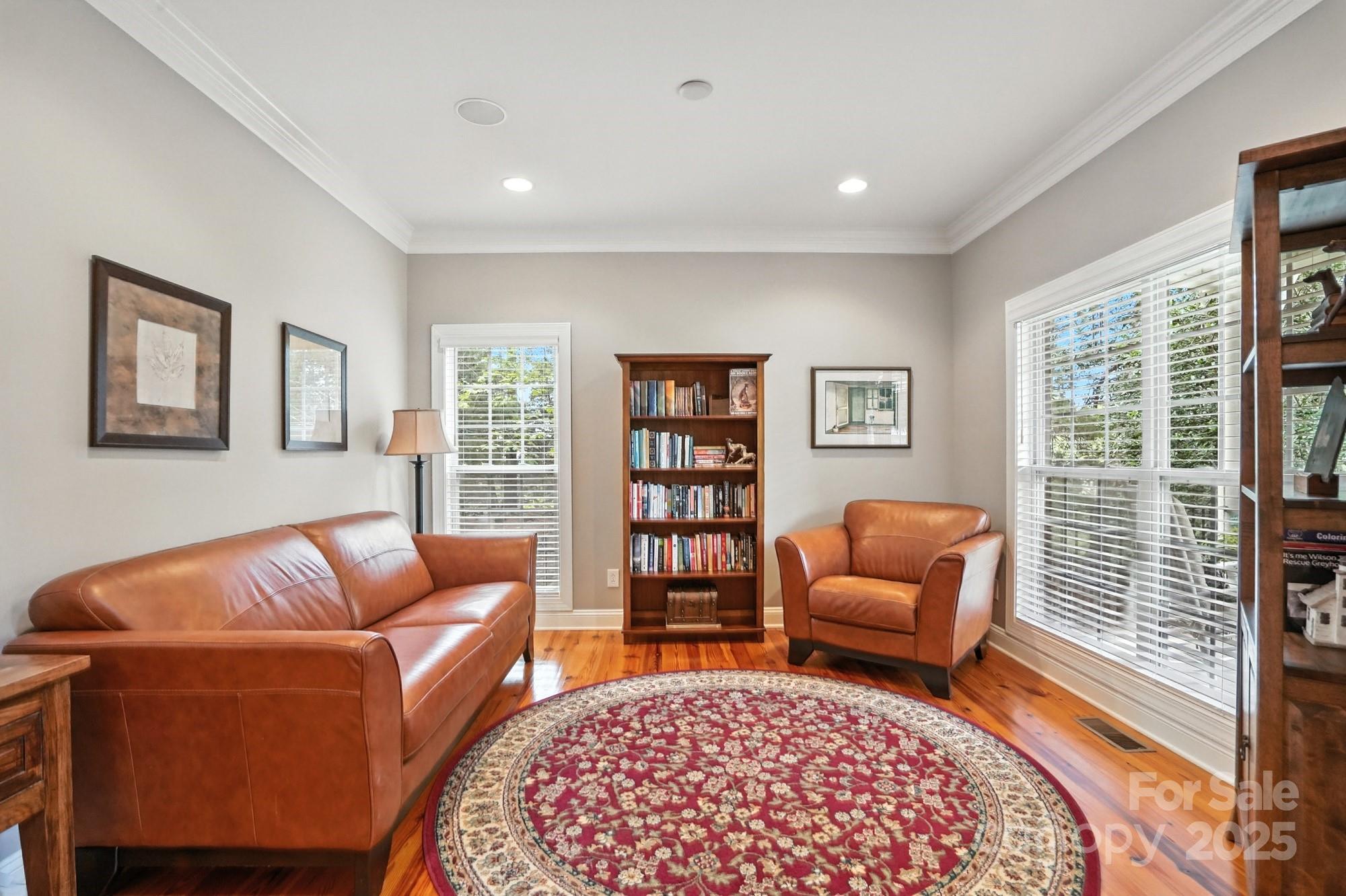 1651 Scotch Pine Lane Tega Cay, SC 29708 - Photo 11 of 48 a living room with furniture and a rug