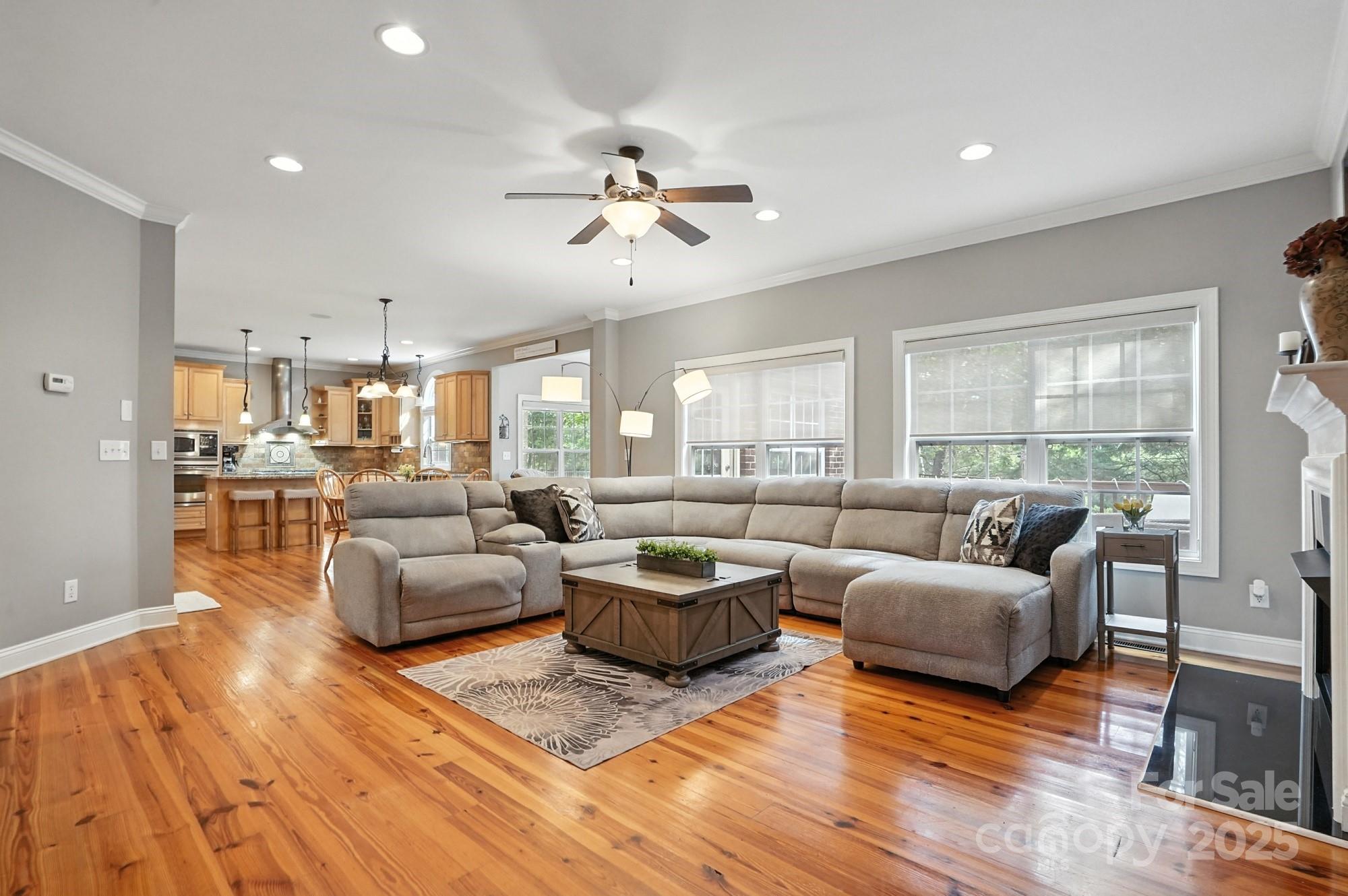 1651 Scotch Pine Lane Tega Cay, SC 29708 - Photo 13 of 48 a living room with furniture and a large window