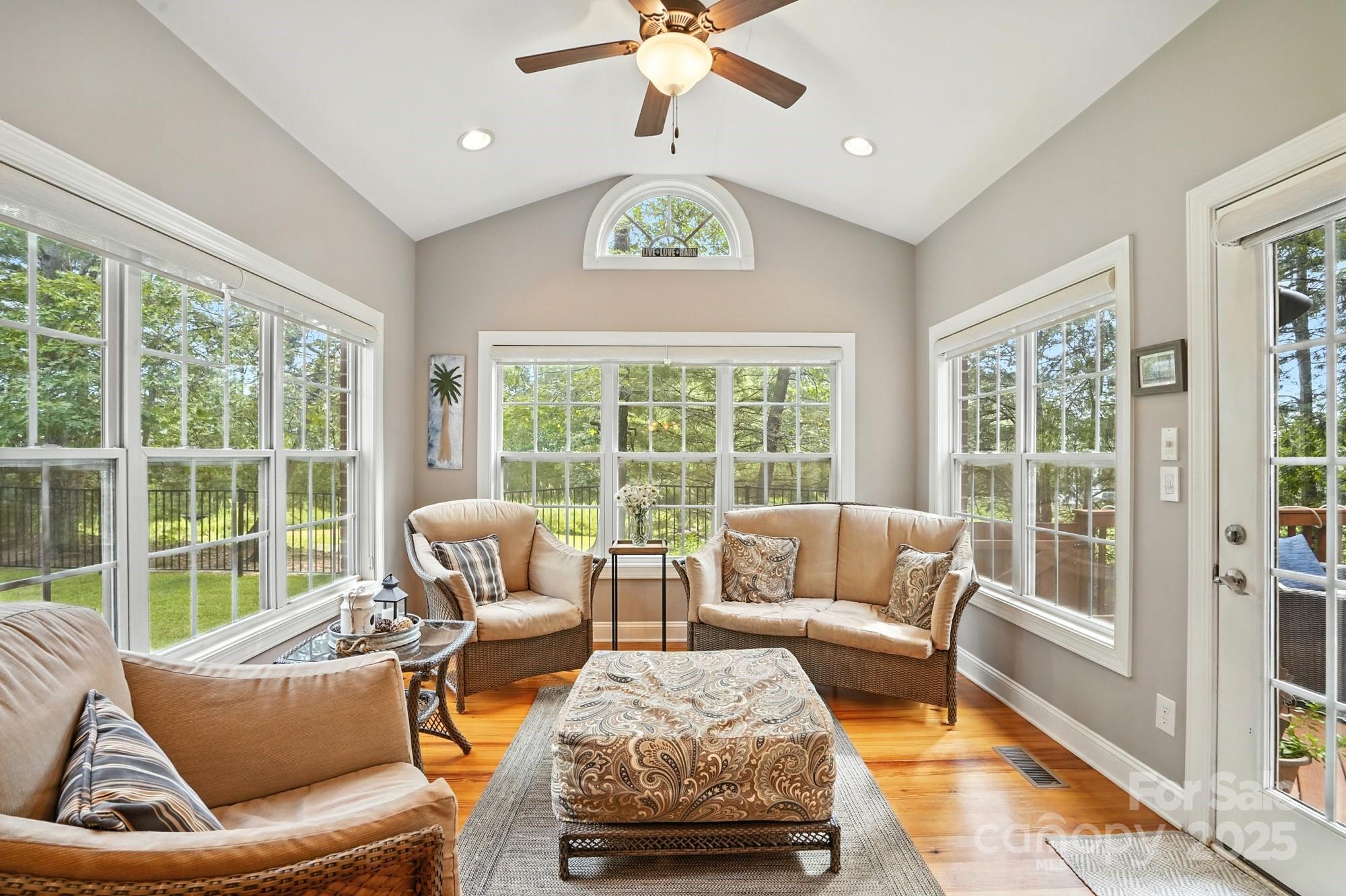 1651 Scotch Pine Lane Tega Cay, SC 29708 - Photo 20 of 48 a living room with furniture and a large window