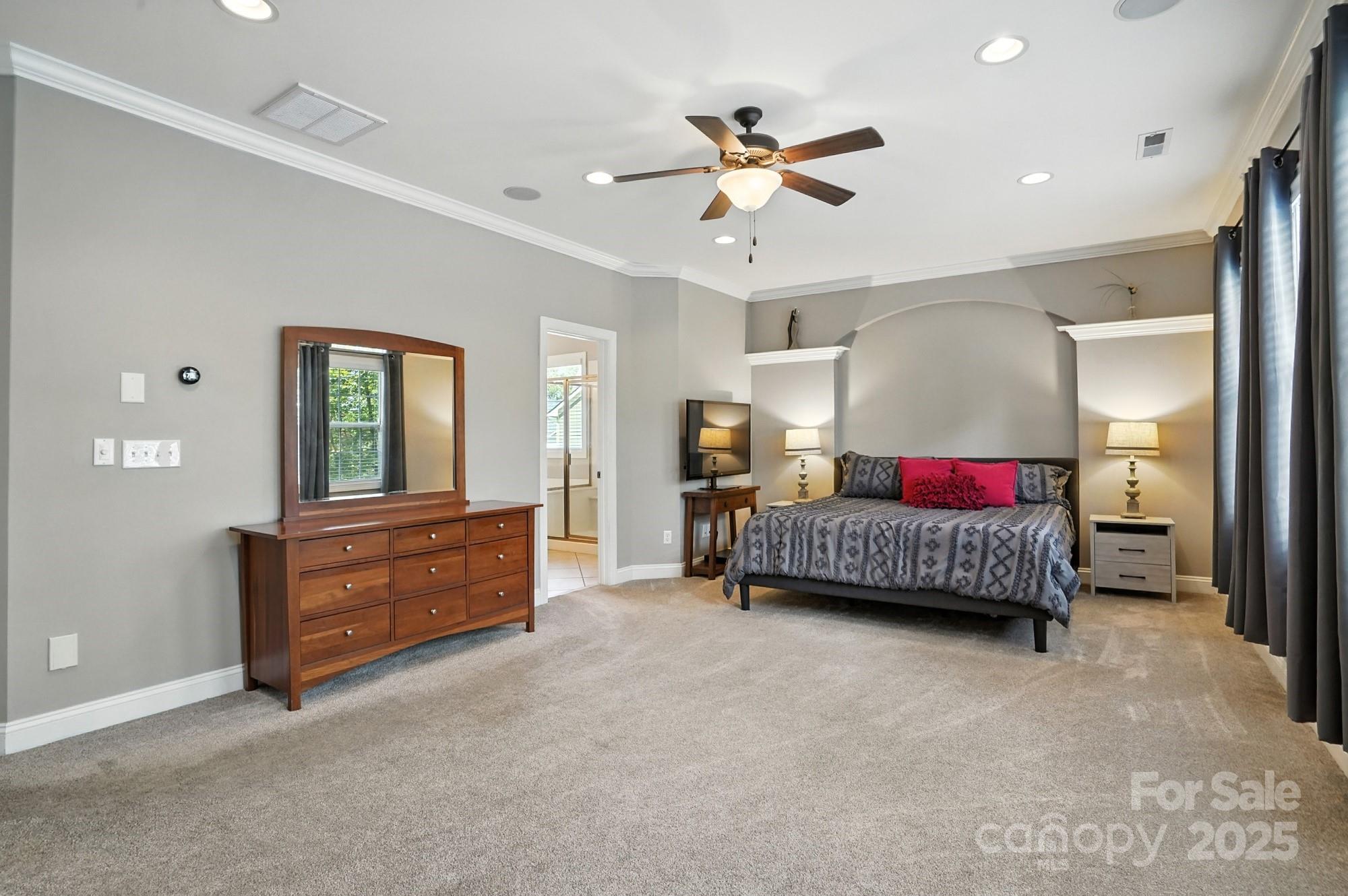 1651 Scotch Pine Lane Tega Cay, SC 29708 - Photo 25 of 48 a living room with furniture and a chandelier