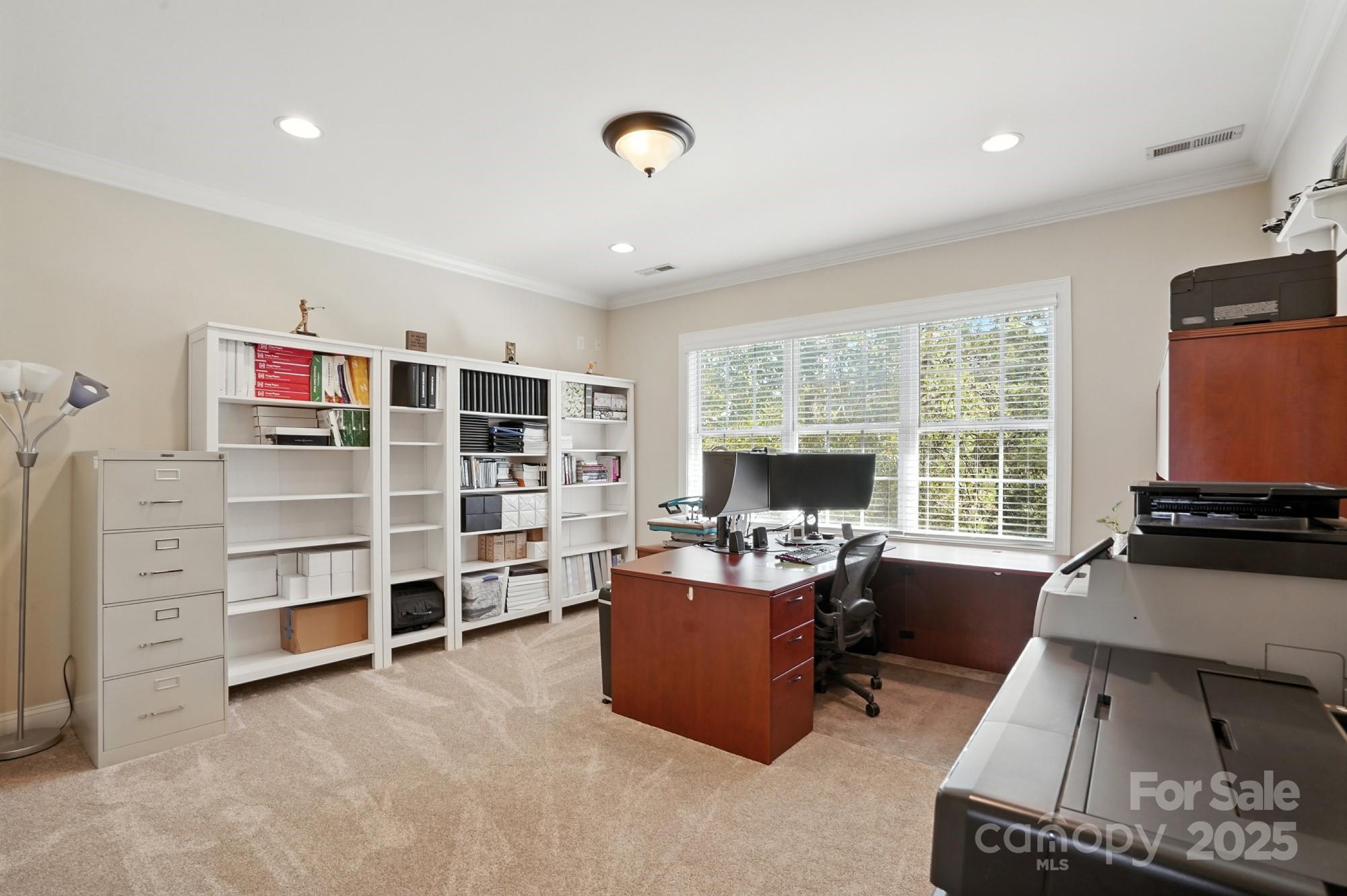 1651 Scotch Pine Lane Tega Cay, SC 29708 - Photo 35 of 48 a view of a livingroom with furniture and windows