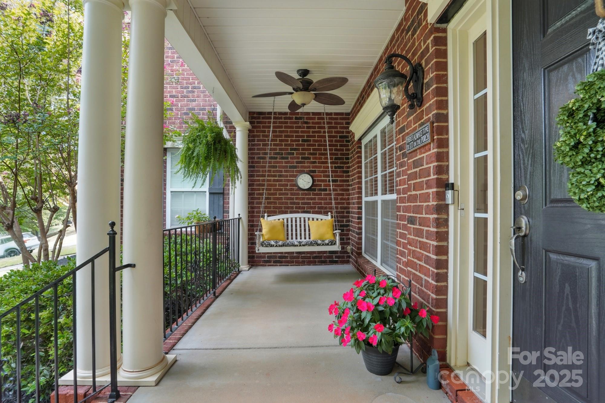 1651 Scotch Pine Lane Tega Cay, SC 29708 - Photo 6 of 48 a potted plant sitting in front of a house