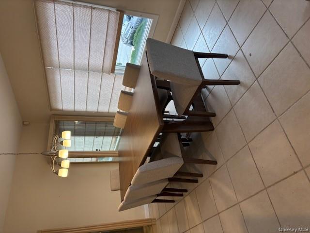 54 Matlock Street Long Beach, NY 11561 - Photo 14 of 22 a dining room with furniture and window