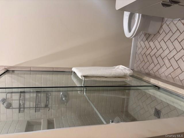 54 Matlock Street Long Beach, NY 11561 - Photo 18 of 22 a bathroom with a toilet and shower