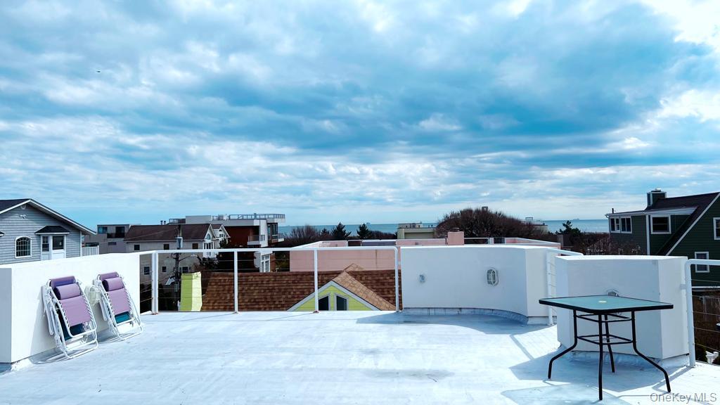 54 Matlock Street Long Beach, NY 11561 - Photo 4 of 22 a view of a terrace with furniture