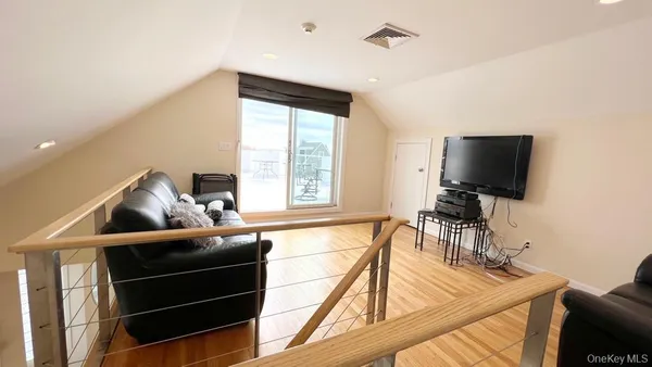 a view of pool table and chairs in patio