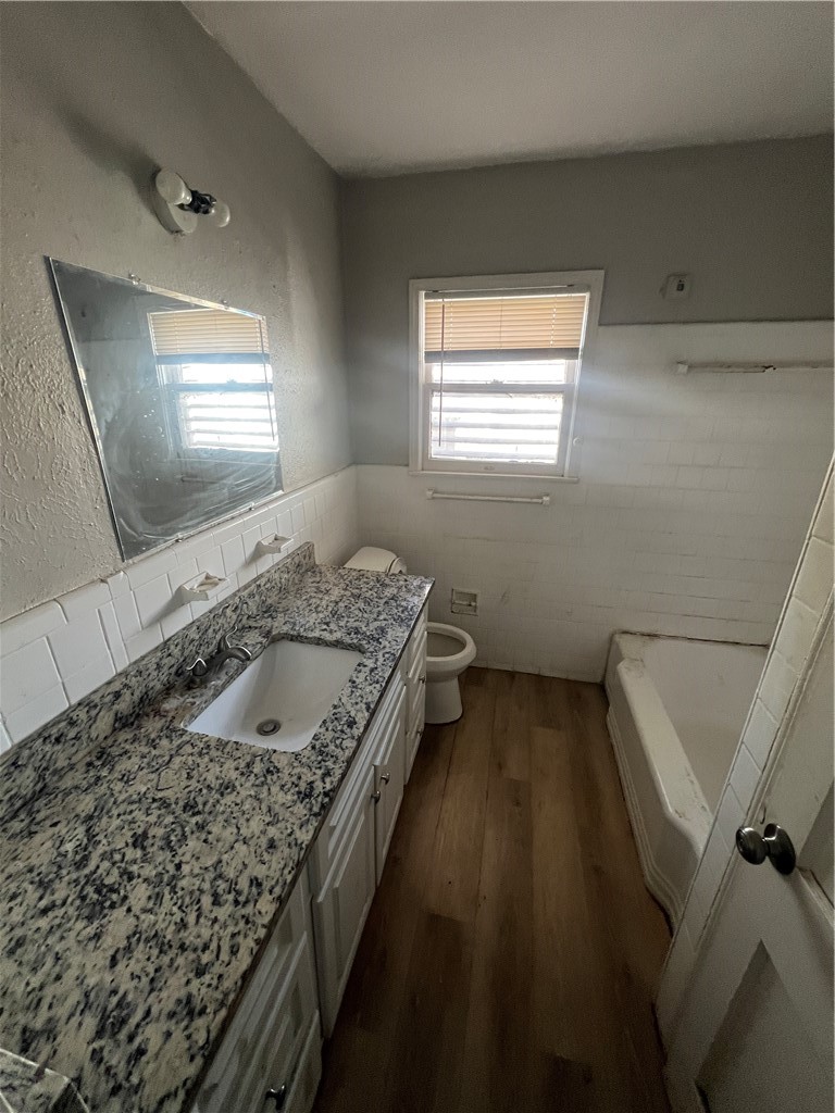 4031 West Vanderbilt Drive Corpus Christi, TX 78415 - Photo 5 of 9 a kitchen with a sink and a window