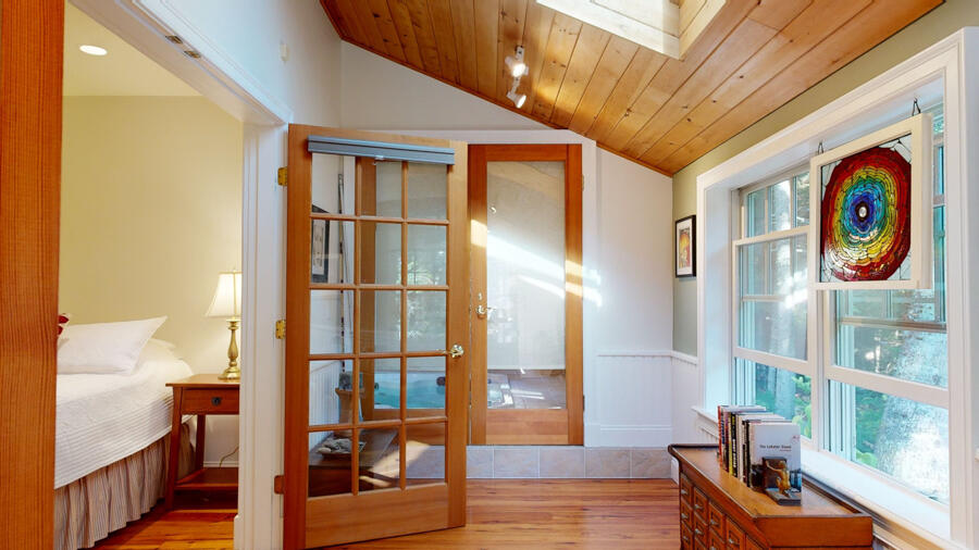 29 Boulder Hill Road Tenants Harbor, ME 04860 - Photo 34 of 90 Primary Bedroom Hallway & Door To Pool