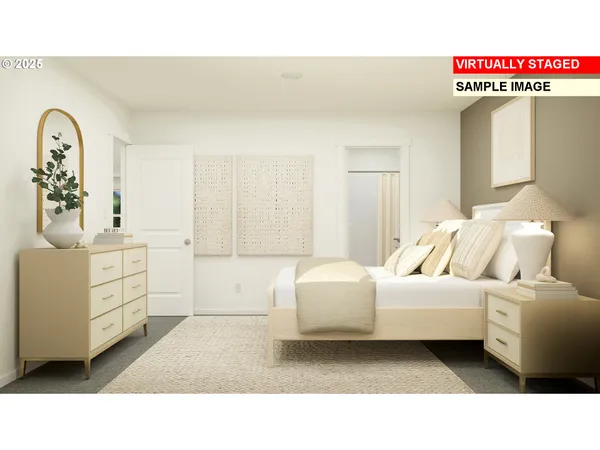 a bedroom with a bed and a dresser