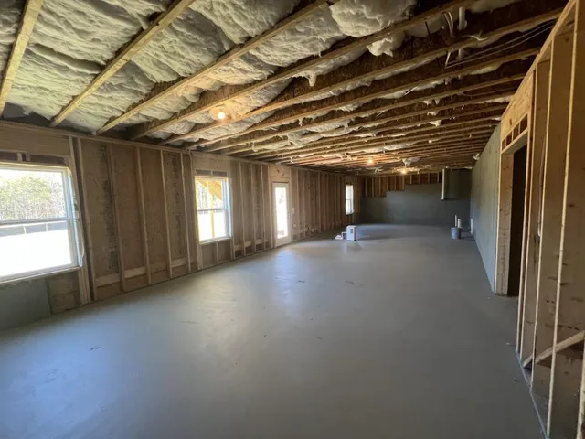 an empty room with windows