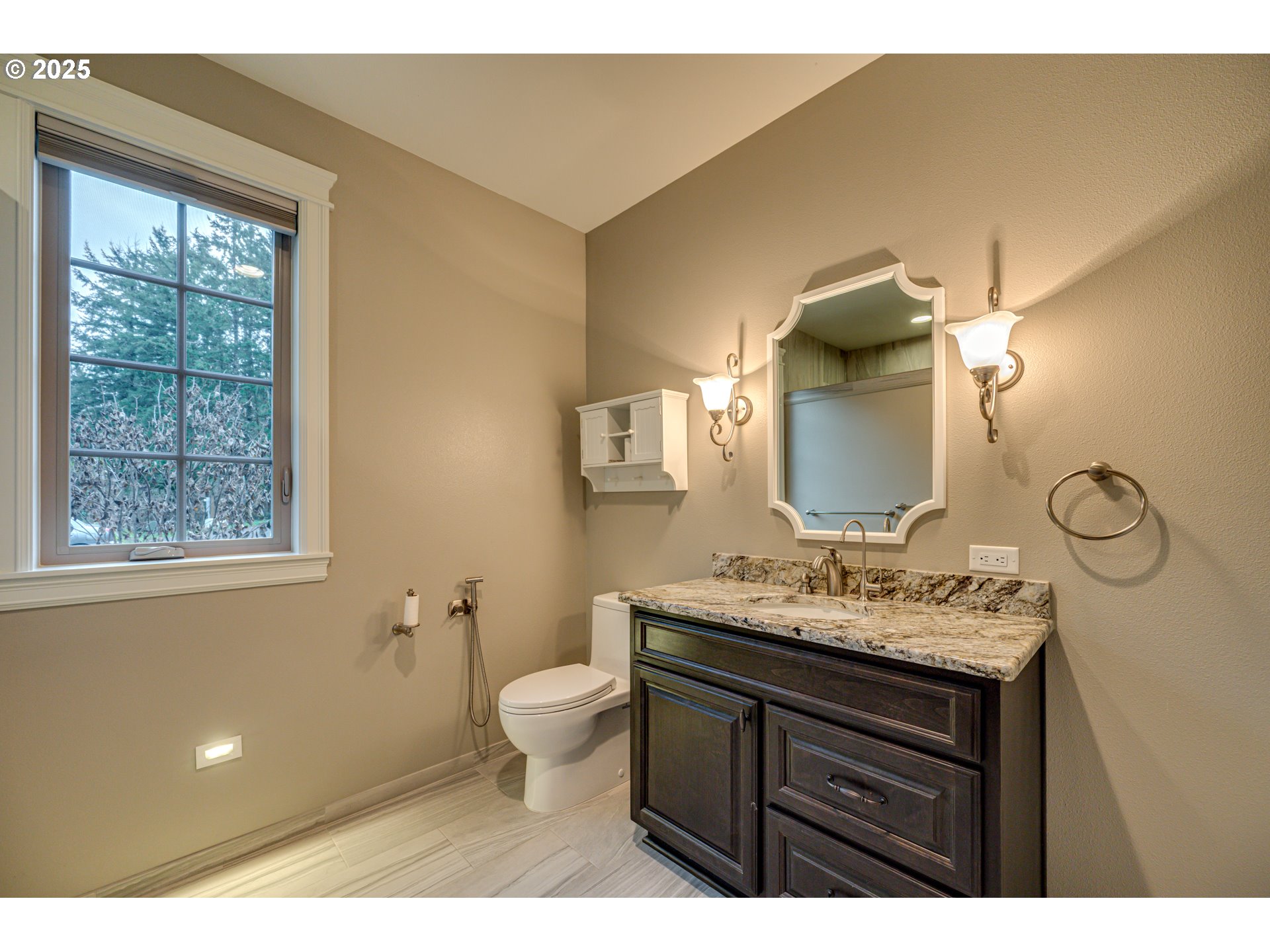 421 Woodland Heights Road Woodland, WA 98674 - Photo 21 of 48 a bathroom with a sink vanity and a mirror