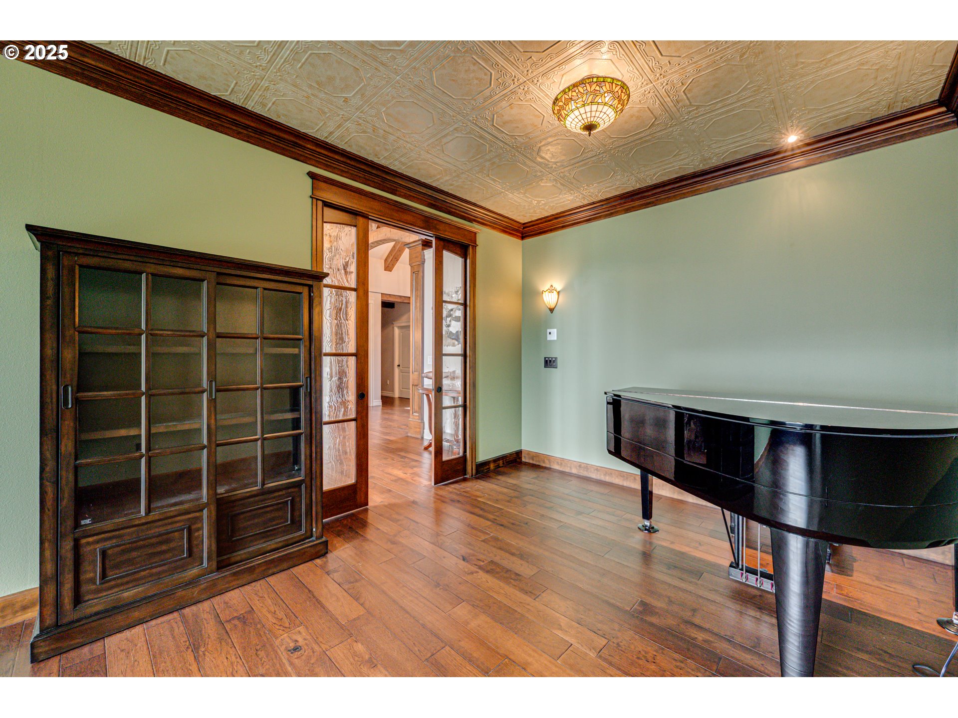 421 Woodland Heights Road Woodland, WA 98674 - Photo 27 of 48 a view of an empty room with wooden floor and a window