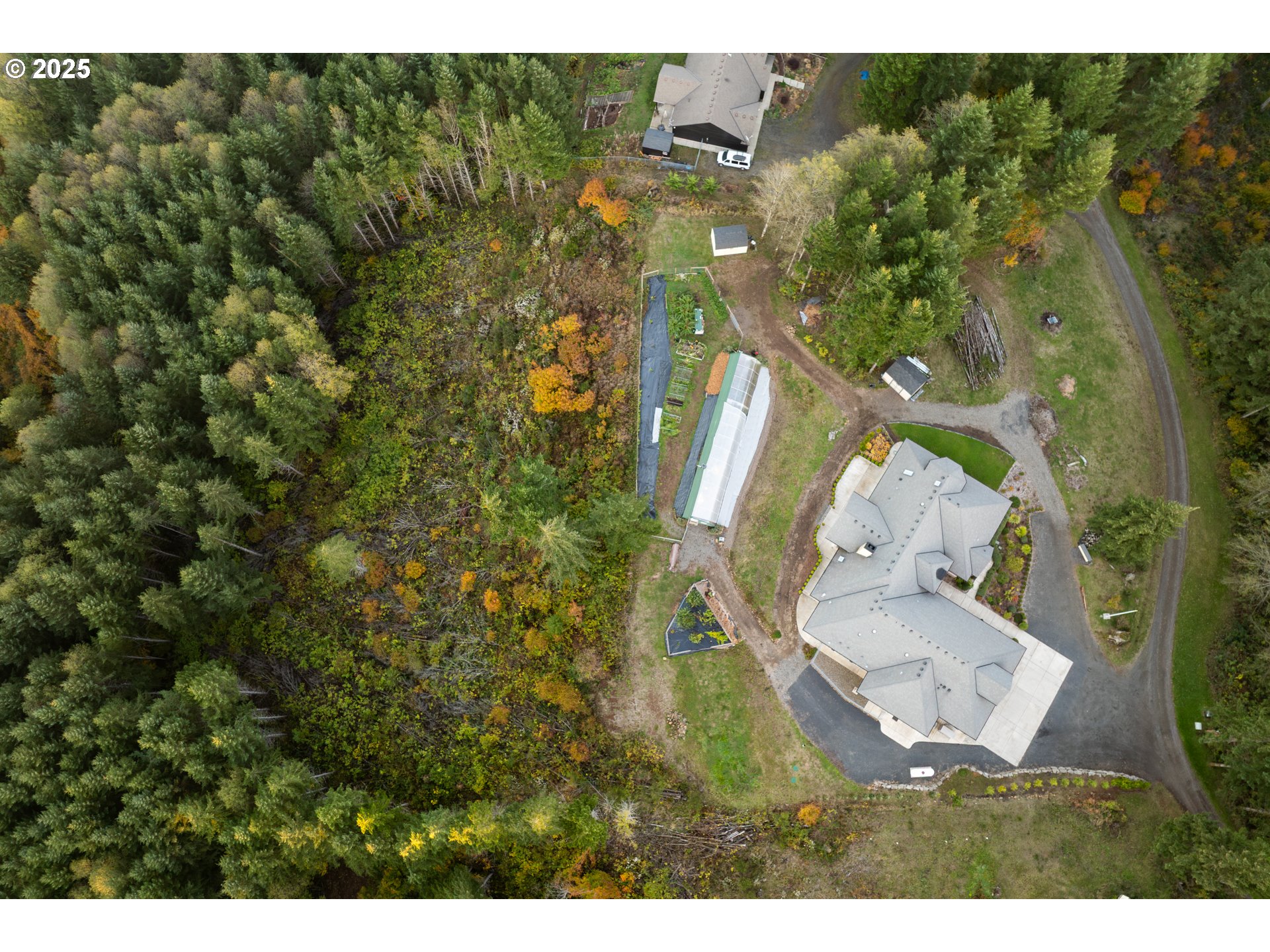 421 Woodland Heights Road Woodland, WA 98674 - Photo 46 of 48 a aerial view of a house with a yard basket ball court and outdoor seating