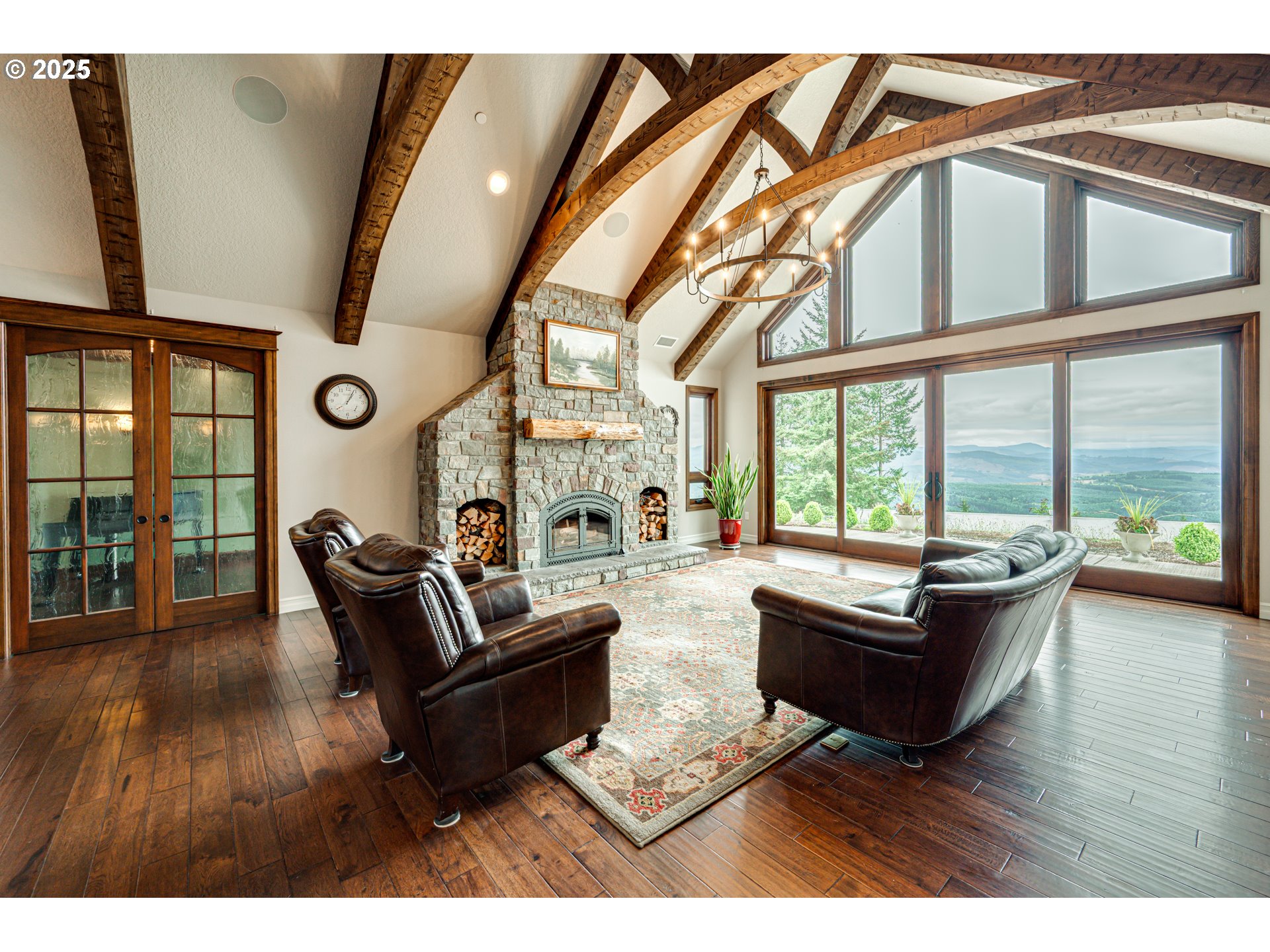 421 Woodland Heights Road Woodland, WA 98674 - Photo 10 of 48 a living room with furniture and a large window