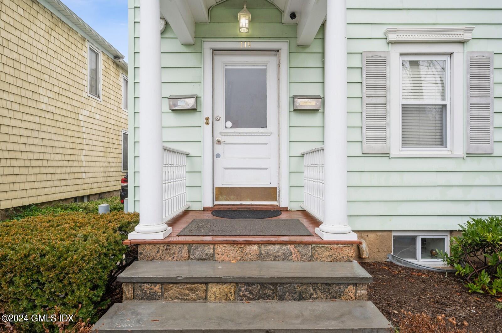 119 Halstead Avenue, Unit 2 Greenwich, CT 06831 - Photo 2 of 29 a view of a entryway door front of house