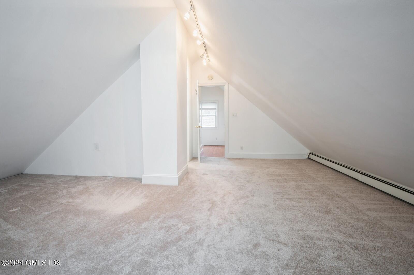 119 Halstead Avenue, Unit 2 Greenwich, CT 06831 - Photo 24 of 29 a view of an empty room with a window