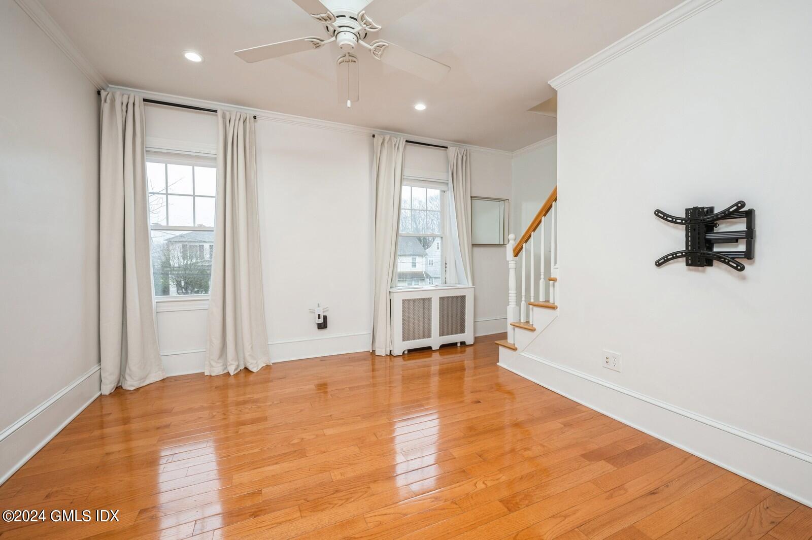 119 Halstead Avenue, Unit 2 Greenwich, CT 06831 - Photo 4 of 29 a view of an empty room with a window