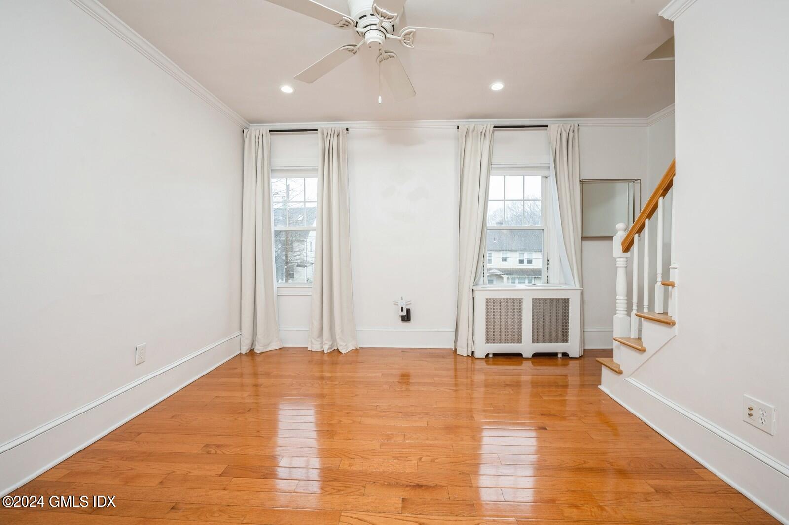 119 Halstead Avenue, Unit 2 Greenwich, CT 06831 - Photo 5 of 29 a view of an empty room with a window