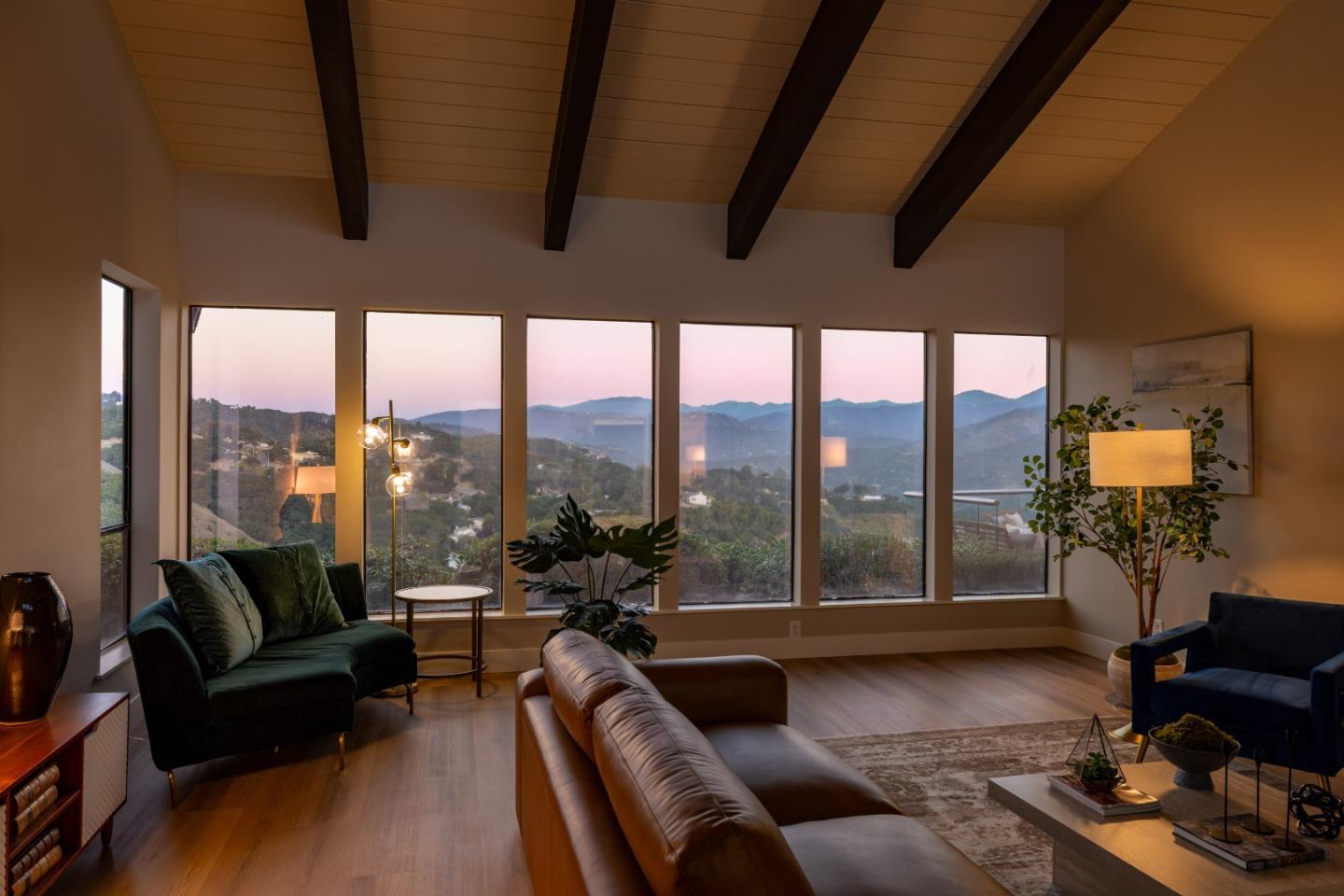 13399 Middle Canyon Road Carmel Valley, CA 93924 - Photo 29 of 32 a living room with furniture and a floor to ceiling window