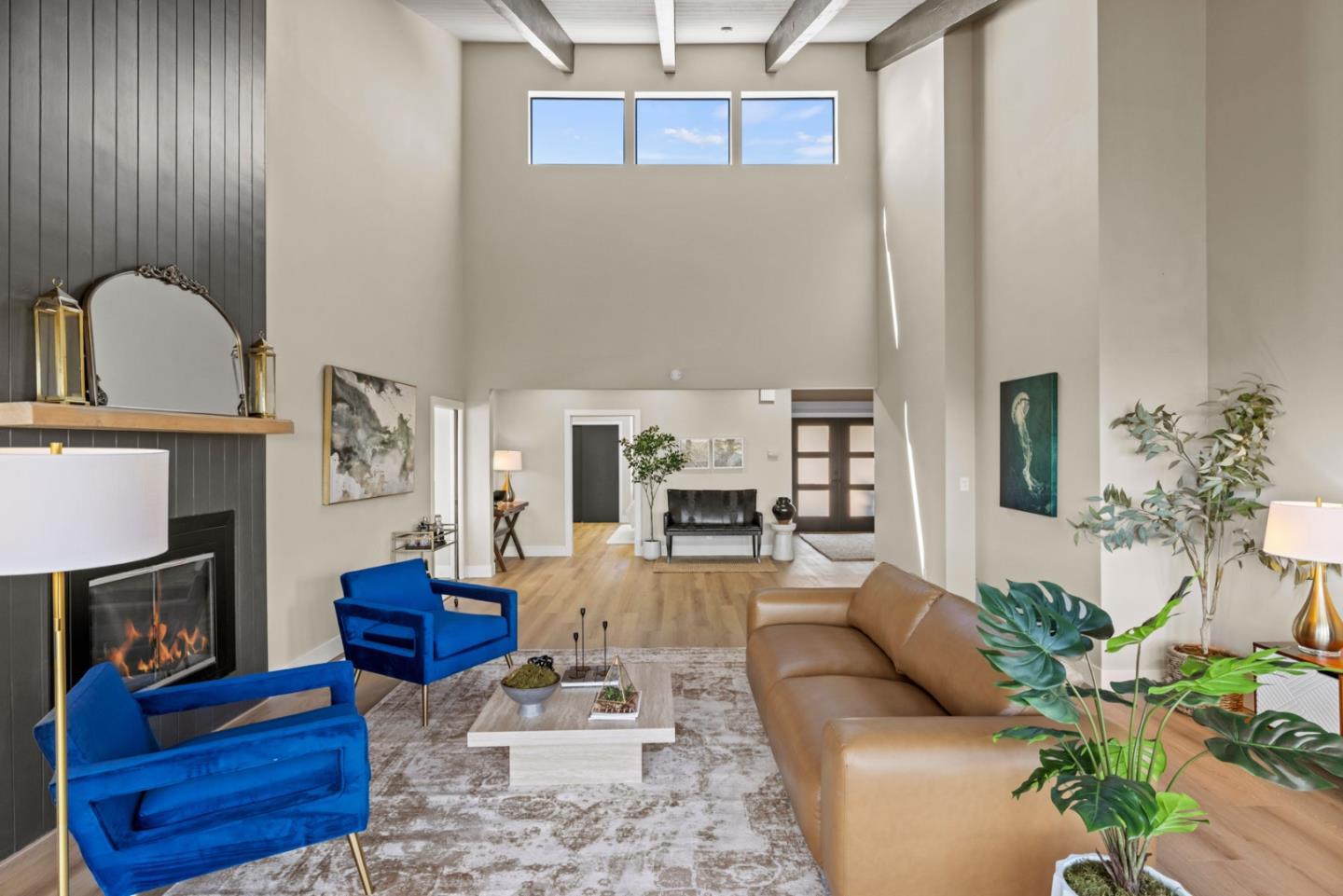 13399 Middle Canyon Road Carmel Valley, CA 93924 - Photo 7 of 32 a living room with furniture fireplace and wooden floor