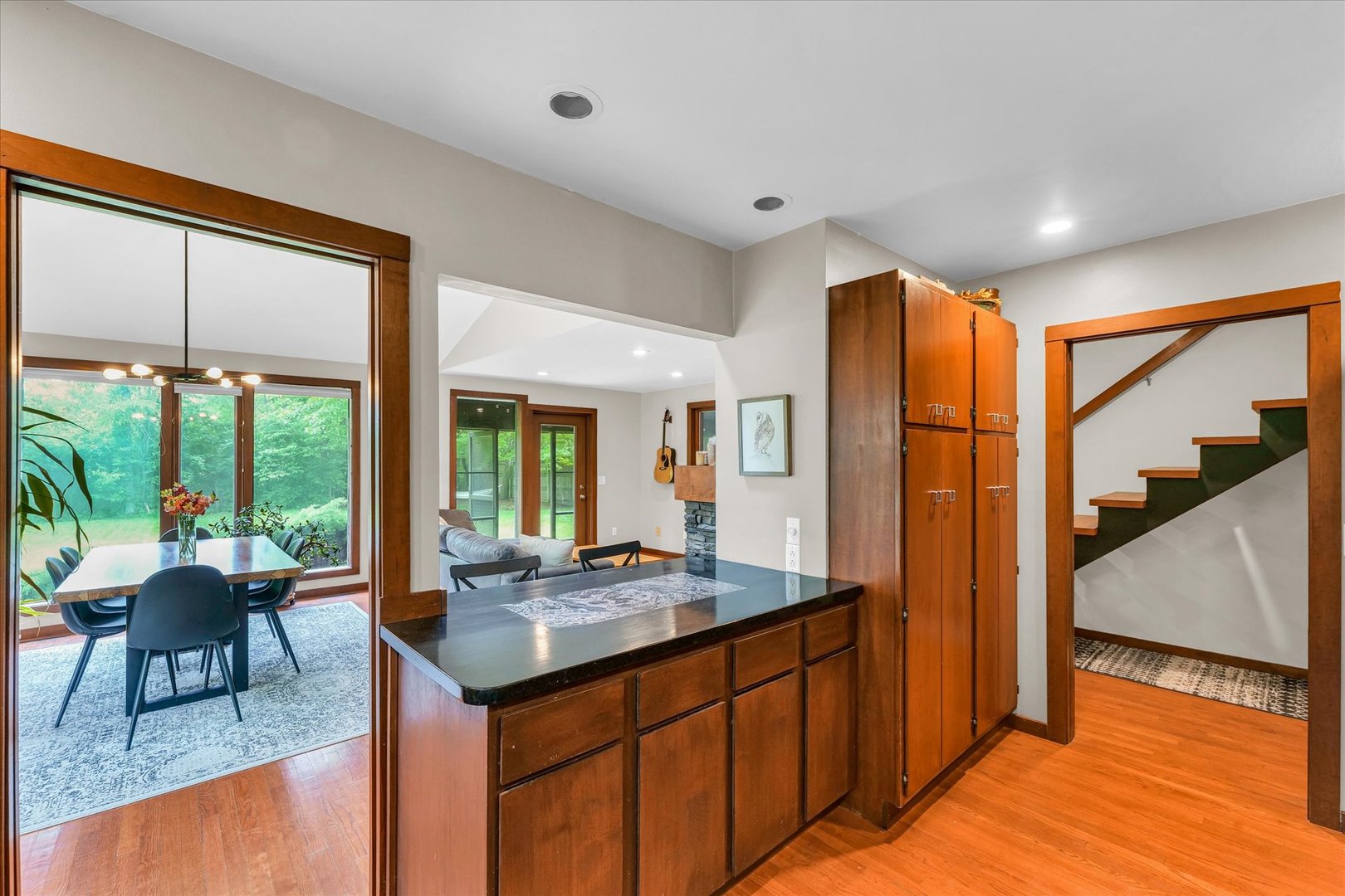 1910 Stratford Court Champaign, IL 61821 - Photo 18 of 39 a living room with stainless steel appliances granite countertop furniture a sink and a large window