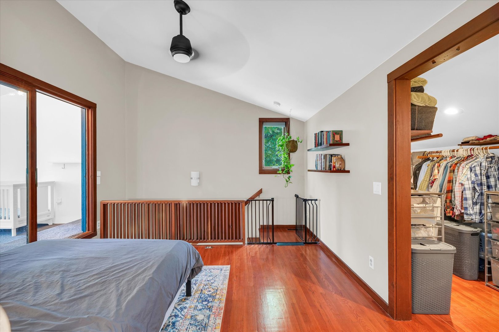 1910 Stratford Court Champaign, IL 61821 - Photo 25 of 39 a bedroom with furniture and a wooden floor