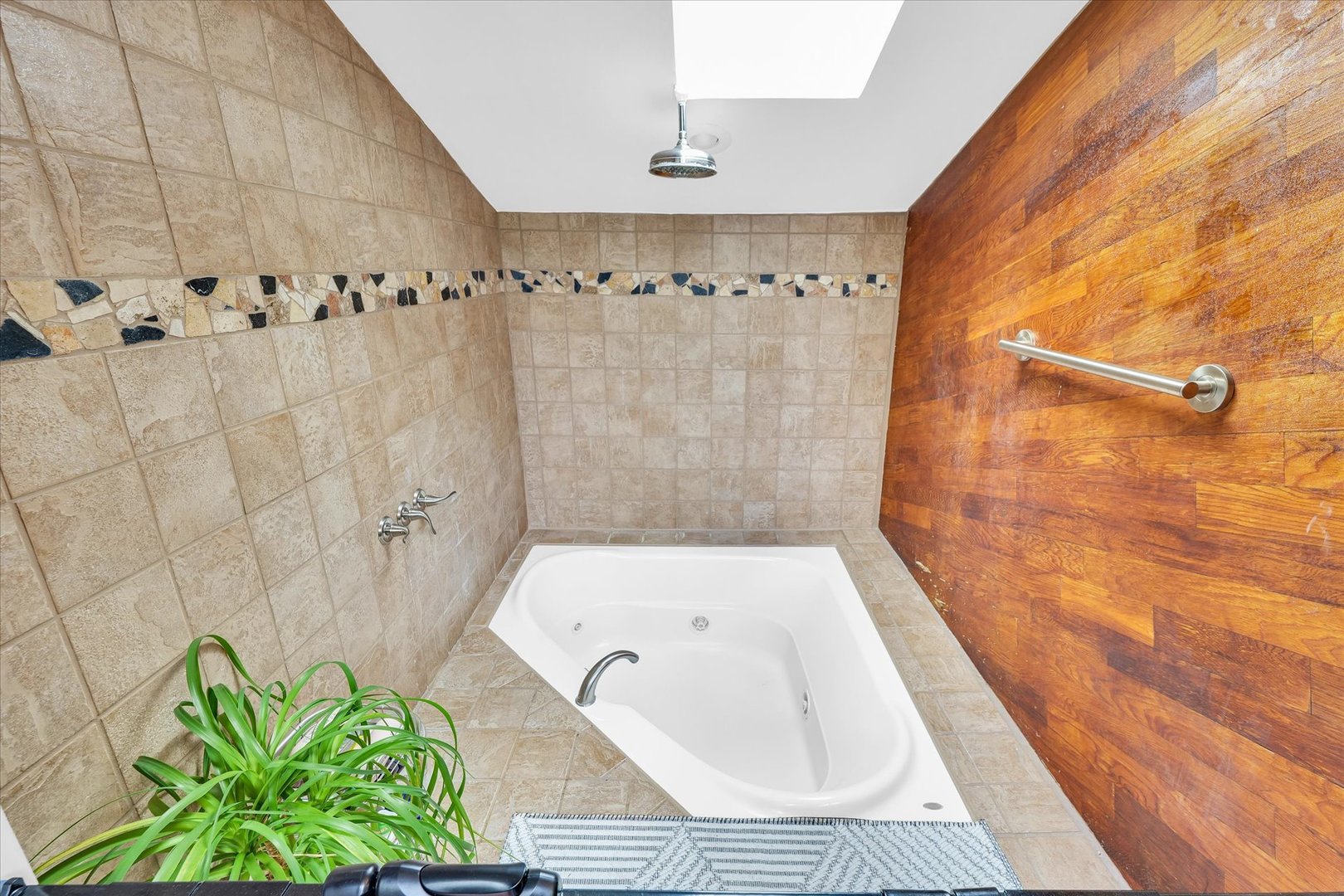 1910 Stratford Court Champaign, IL 61821 - Photo 27 of 39 a bathroom with a shower curtain and a bathtub