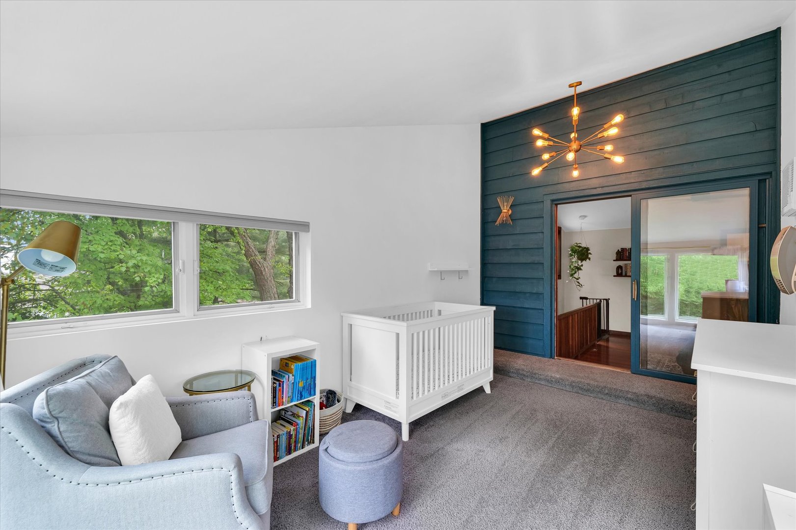 1910 Stratford Court Champaign, IL 61821 - Photo 31 of 39 a living room with furniture and a flat screen tv