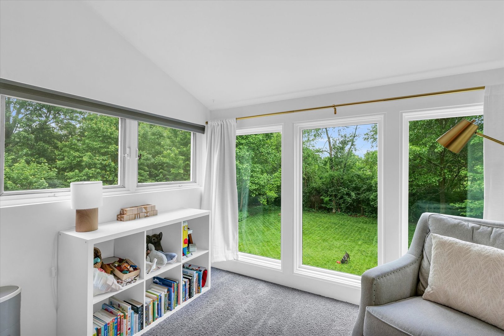 1910 Stratford Court Champaign, IL 61821 - Photo 32 of 39 a view of a living room and a floor to ceiling window