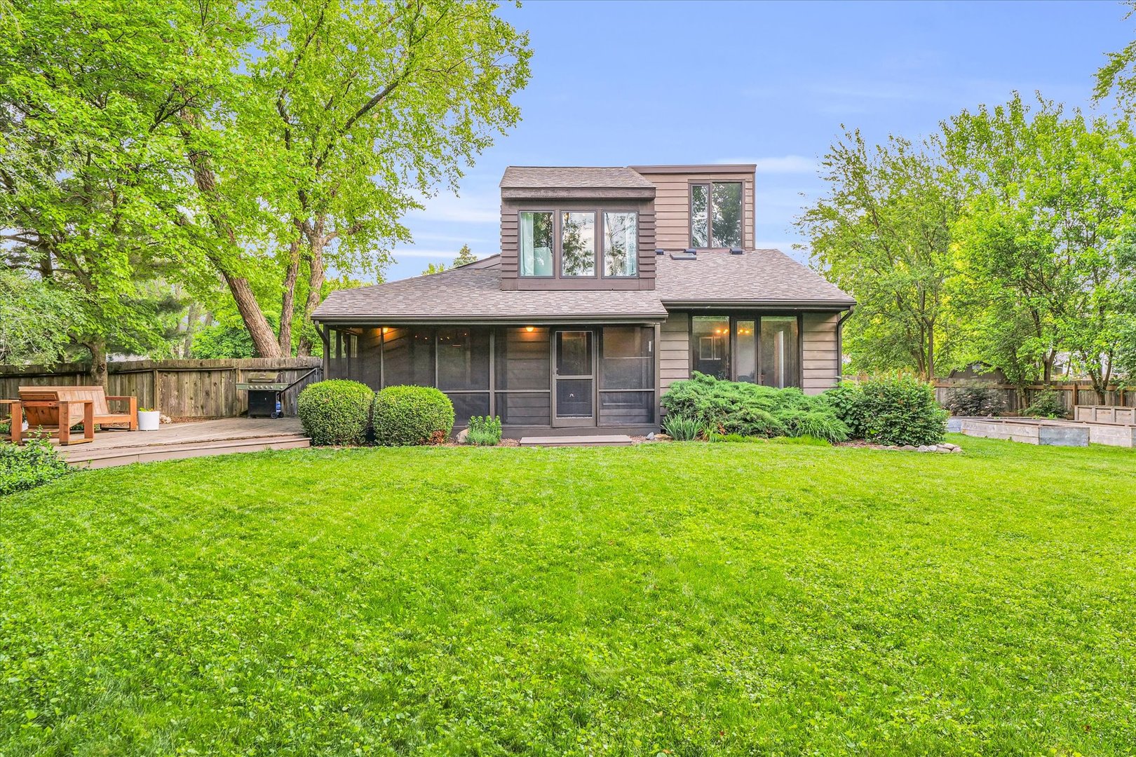 1910 Stratford Court Champaign, IL 61821 - Photo 37 of 39 a view of a house with backyard and sitting area